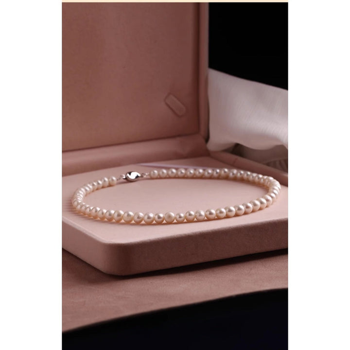 [Handcrafted] 10mm Natural Freshwater Pearl Necklace | High-Luster Round Pearls | Silver Yuanbao Clasp Pearl Unique