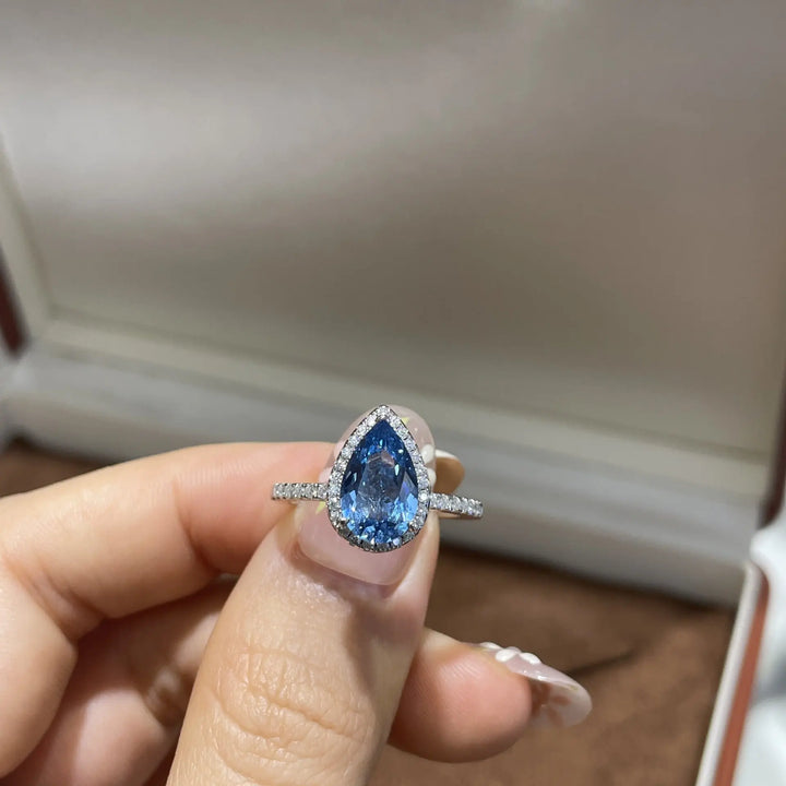 ab-Created Blue Sapphire Teardrop Halo Ring â€?Pear Cut Simulated Gemstone Engagement Ring in Sterling Silver Pearl Unique