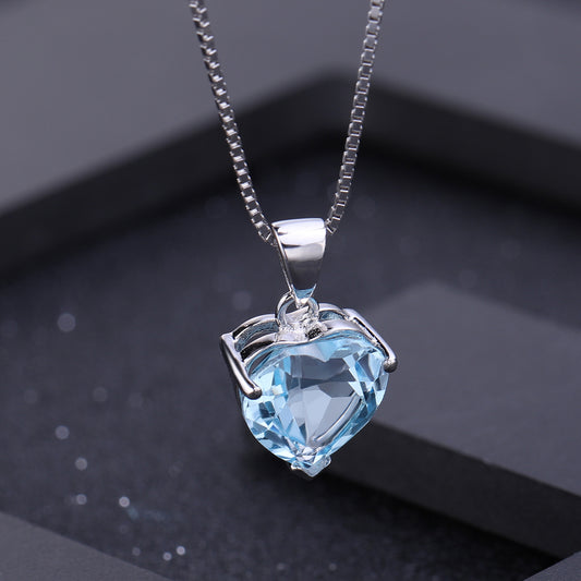 Close-up of 4.4Ct sky blue topaz gemstone heart pendant