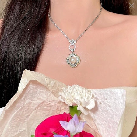 Silver-plated pearl and crystal jewelry set for women, featuring a necklace and matching stud earrings