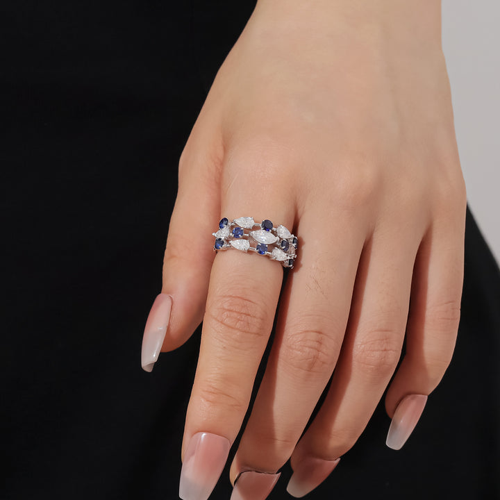 Modern openwork ring with lab-created sapphires and moissanite