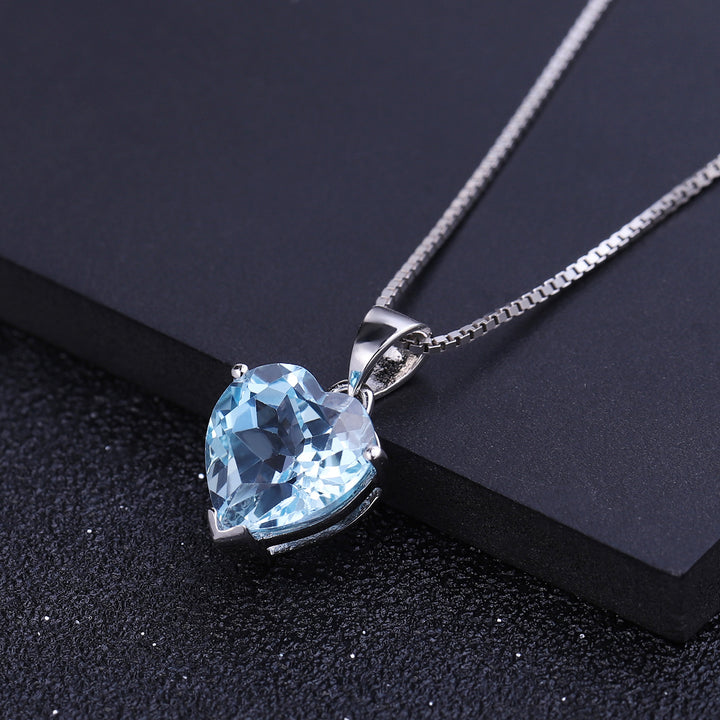 Elegant sterling silver necklace with heart-shaped blue topaz