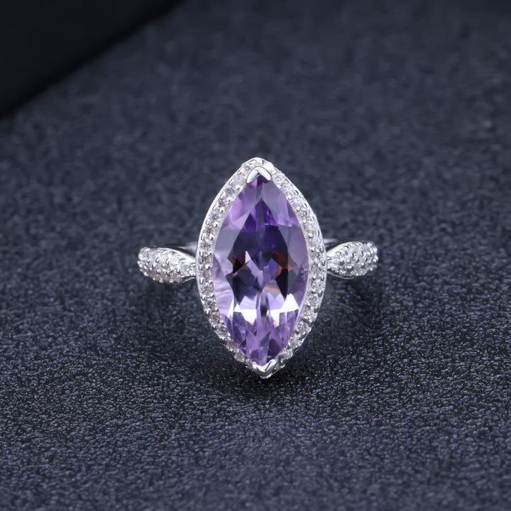 Close-up of marquise cut 4.34 carat natural amethyst gemstone ring