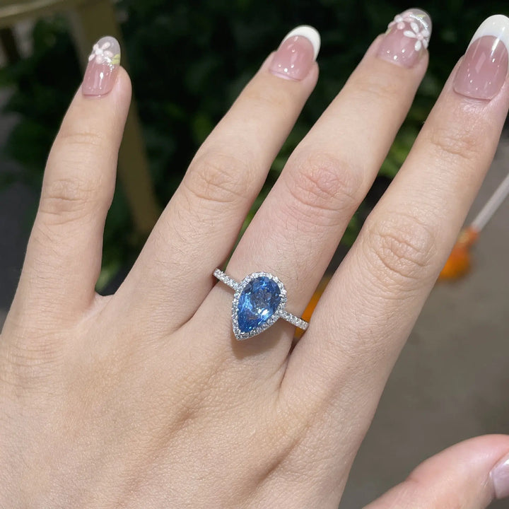 ab-Created Blue Sapphire Teardrop Halo Ring â€?Pear Cut Simulated Gemstone Engagement Ring in Sterling Silver Pearl Unique