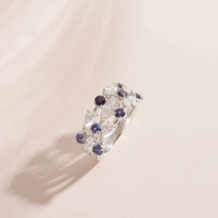 Sterling silver multi-stone fashion ring with blue sapphires and moissanite