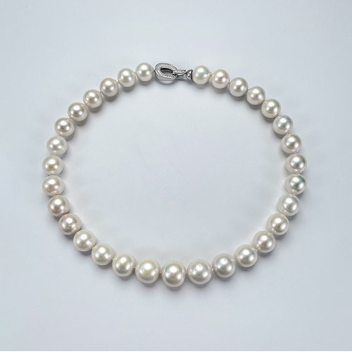 Short pearl choker necklace with natural 9-11mm egg-shaped pearls